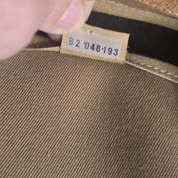 Dooney & Bourke Tassel Canvas/ Leather Satchel - Picture 11 of 12